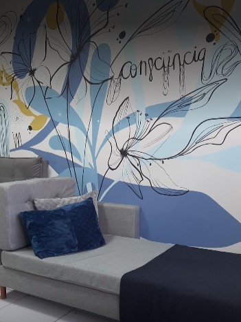 Sala de atendimento com mural Consciência